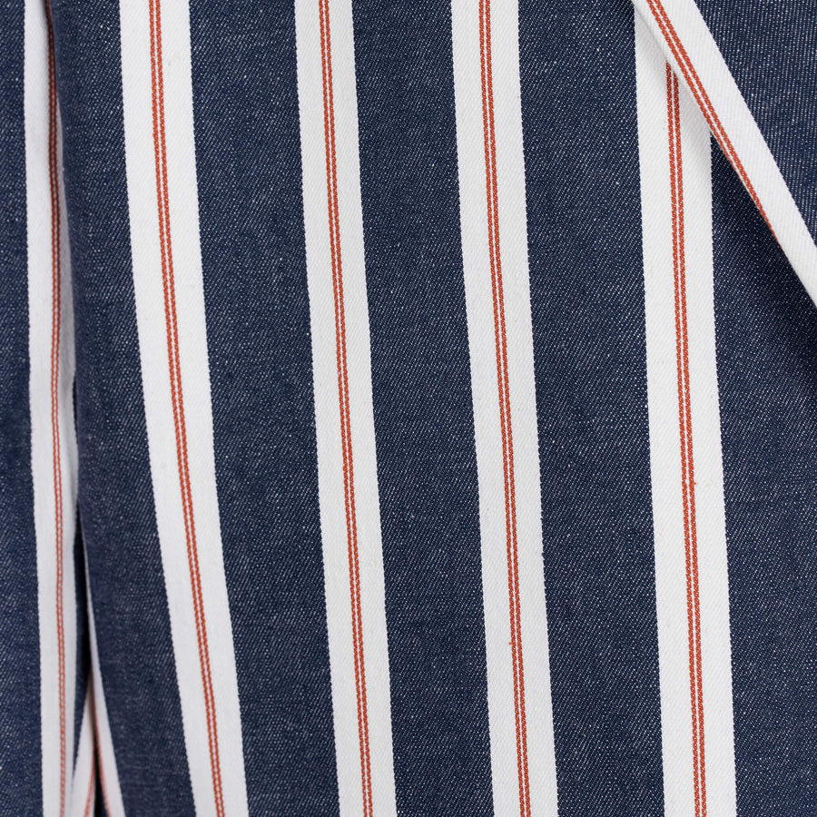 Close-up of a fabric with blue, white, and red stripes.