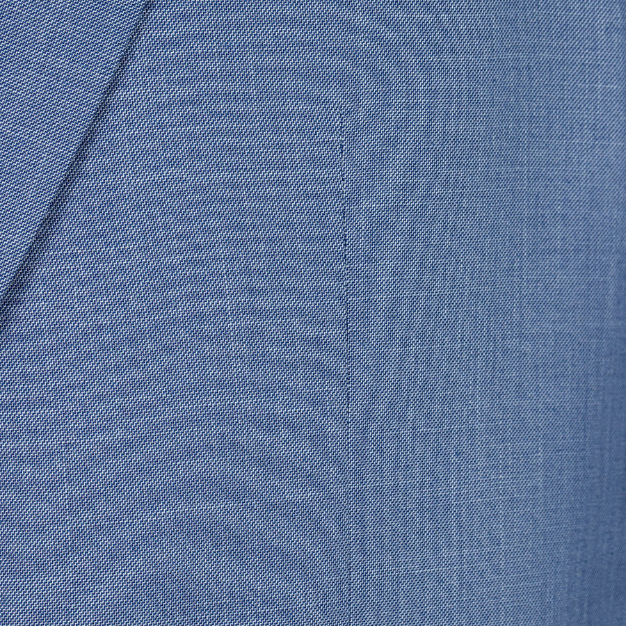 Close-up of blue fabric with a subtle pattern