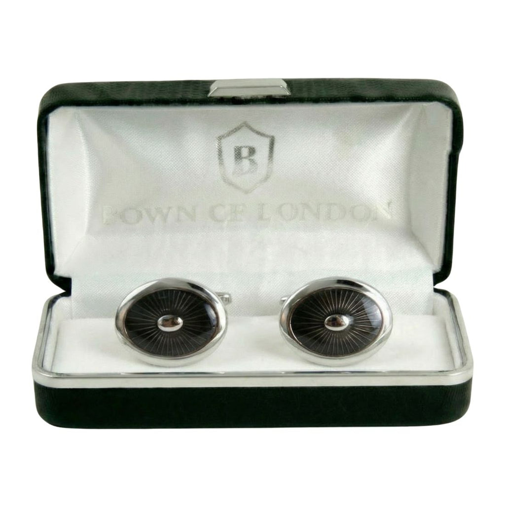 Cufflinks in a 'Bown of London' branded box on a white background
