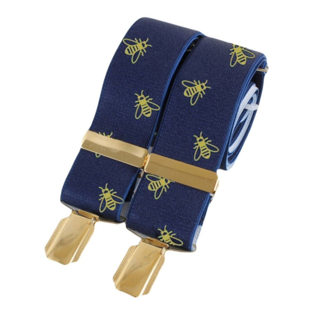 Blue suspenders with yellow bee pattern and gold clips on a white background