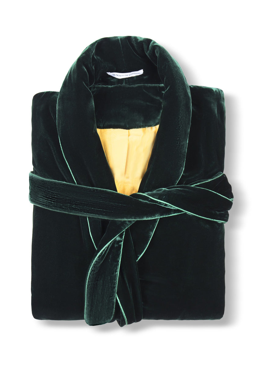 Emerald Isle silk velvet robe folded, showing the gold-coloured lining