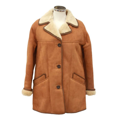 Brown leather coat with white fur lining on a mannequin against a white background