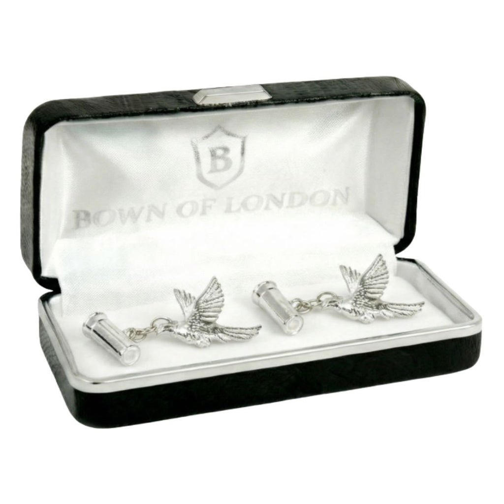 Silver bird-shaped cufflinks in a 'Bown of London' box on a white background