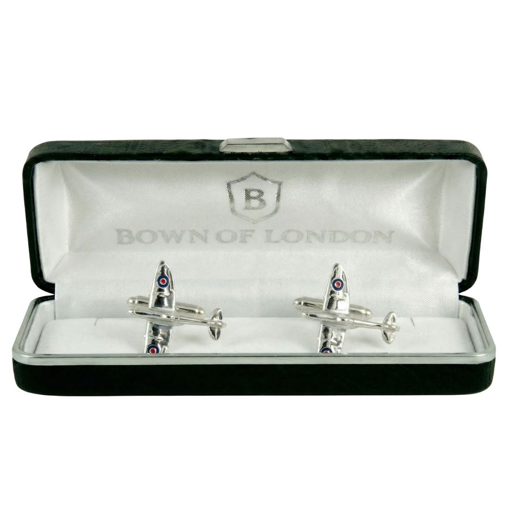 Silver airplane-shaped cufflinks in a Bown of London box