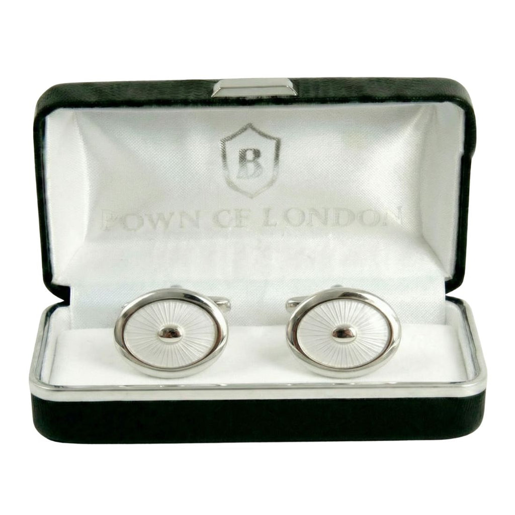 Silver cufflinks in a 'Bown of London' branded box on a white background